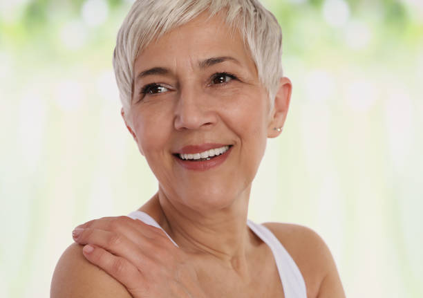 an elder woman smiling