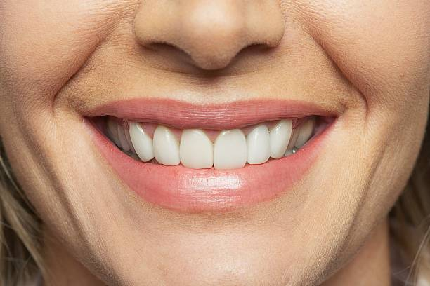 close-up shot of a person's smile