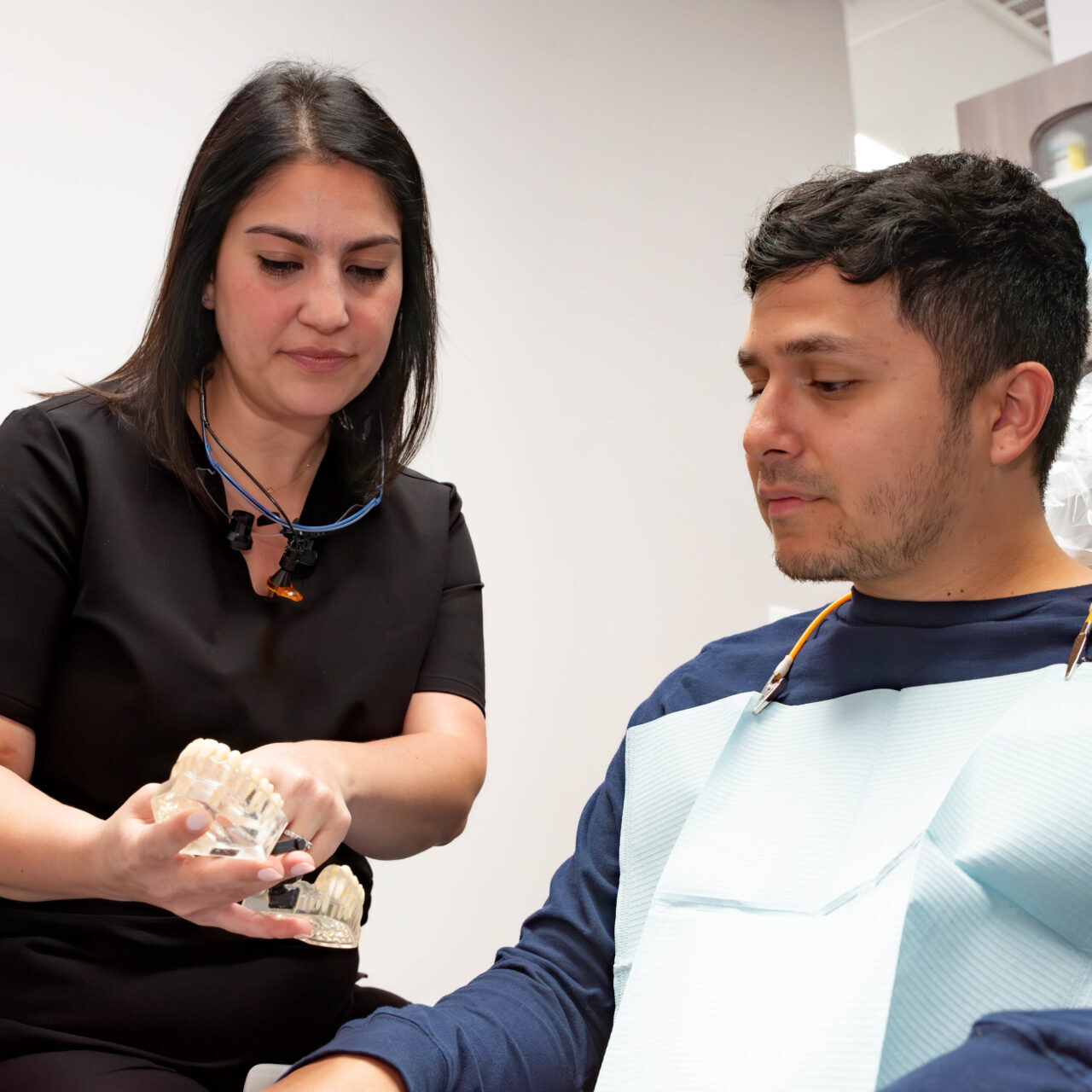 dentist demonstrating to patient